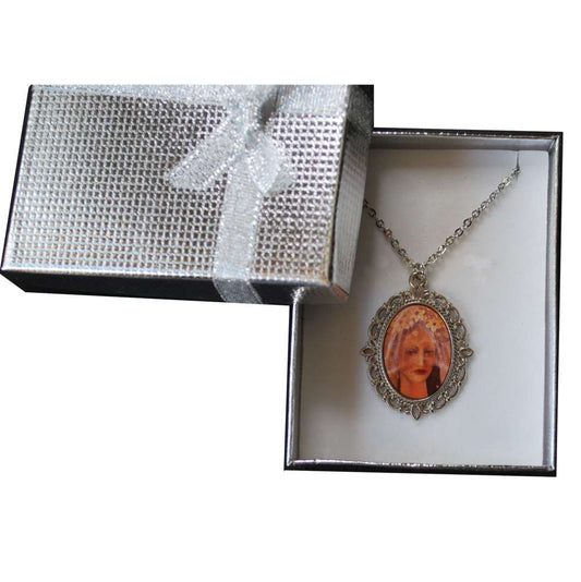 Necklace with a pendant in an open jewelry box