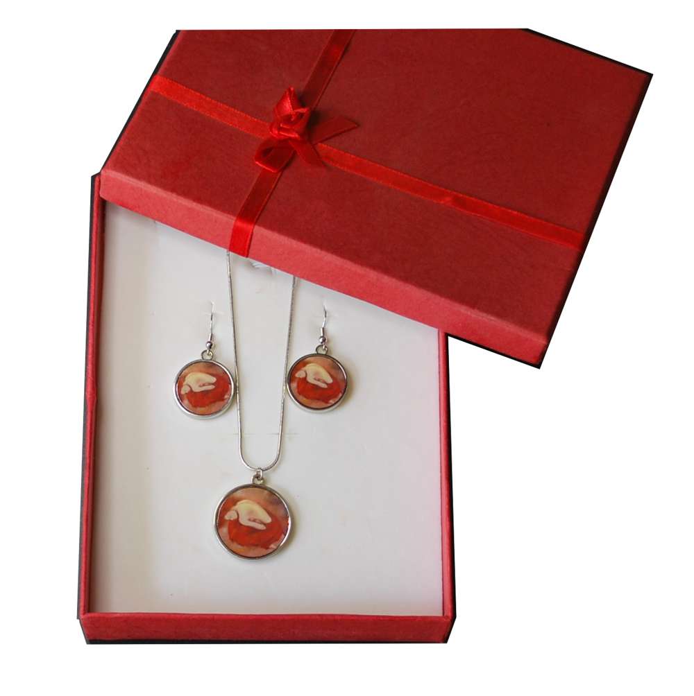 Jewelry set with a round neckace pendant and drop earrings in a red gift box