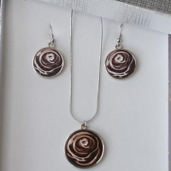 Desert Rose modern art jewellery gifts and sling bag.