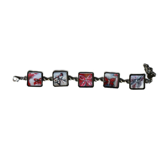 Bracelet with square charms featuring butterfly designs on a white background